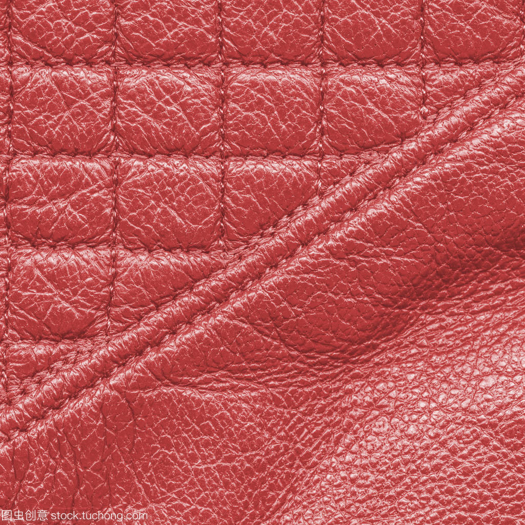 红色的皮革产品的片段。有用的背景